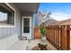 Private patio with comfortable seating and privacy fence at 7185 S Gaylord St # G13, Littleton, CO 80122