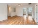 Spacious living room with hardwood floors and natural light at 5120 Perth St, Denver, CO 80249