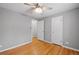 Bedroom with wood flooring, and two doors leading to other spaces at 2545 W 45Th Ave, Denver, CO 80211