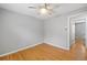 Bright bedroom with hardwood floors and a ceiling fan with lighting at 2545 W 45Th Ave, Denver, CO 80211