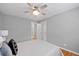 Bedroom featuring a ceiling fan and neutral walls at 2545 W 45Th Ave, Denver, CO 80211