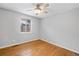 Bedroom with hardwood floors and a window for natural light at 2545 W 45Th Ave, Denver, CO 80211