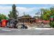 The Monkey Barrel establishment featuring spacious outdoor seating and modern architectural design at 2545 W 45Th Ave, Denver, CO 80211