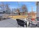 Inviting backyard displaying a concrete patio with furniture, grill, RV, and a privacy fence at 6835 W 55Th Pl, Arvada, CO 80002