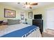 Comfortable bedroom with a ceiling fan and view at 6835 W 55Th Pl, Arvada, CO 80002