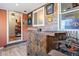 Unique living room with a built-in bar at 6835 W 55Th Pl, Arvada, CO 80002