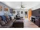 Inviting living room with comfortable seating, hardwood floors, and an open entrance at 6835 W 55Th Pl, Arvada, CO 80002