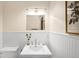 Bright, updated bathroom with new sink, vanity, and modern fixtures at 1256 N Emerson St, Denver, CO 80218