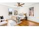 Bedroom with natural light, ceiling fan, wood floors and a calm and relaxing atmosphere at 1256 N Emerson St, Denver, CO 80218