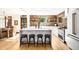 Stylish kitchen features a large island with seating and modern appliances at 1256 N Emerson St, Denver, CO 80218