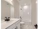 Bathroom with white vanity, bathtub, and marble floor at 9633 Browns Peak Cir, Littleton, CO 80125