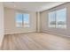 Spacious bedroom with large windows and neutral decor at 9633 Browns Peak Cir, Littleton, CO 80125