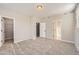 Bedroom with carpet flooring and ensuite bathroom access at 9633 Browns Peak Cir, Littleton, CO 80125