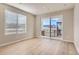 Bright living room with sliding glass doors and mountain views at 9633 Browns Peak Cir, Littleton, CO 80125