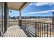 Covered porch overlooking a residential neighborhood at 9633 Browns Peak Cir, Littleton, CO 80125