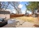 A well maintained backyard featuring a gravel area with seating perfect for outdoor enjoyment at 3925 Newland St, Wheat Ridge, CO 80033