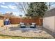 A well maintained backyard featuring a gravel area with seating perfect for outdoor enjoyment at 3925 Newland St, Wheat Ridge, CO 80033