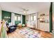 Charming Bedroom with ceiling fan, natural light and colorful rug at 4645 W Temple Pl, Denver, CO 80236