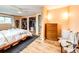 Spacious bedroom with walk-in closets, wood floors and a ceiling fan at 4645 W Temple Pl, Denver, CO 80236