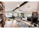 Large living room with vaulted ceiling, natural light and wood floors at 4645 W Temple Pl, Denver, CO 80236
