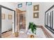 Modern bathroom with frameless shower, garden tub, natural light, and earth-tone color scheme at 1053 Red Moon Rd, Evergreen, CO 80439