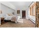 Bedroom featuring neutral color scheme, plush carpet, and a view to a walk-in closet at 1053 Red Moon Rd, Evergreen, CO 80439