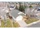 Aerial view of a house and surrounding homes at 9488 Brook Ln, Lone Tree, CO 80124