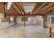 Unfinished basement with high ceilings and potential for expansion at 9488 Brook Ln, Lone Tree, CO 80124