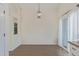 Spacious dining area with hardwood floors and a chandelier at 9488 Brook Ln, Lone Tree, CO 80124