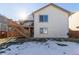 House exterior showcasing back deck and yard at 9488 Brook Ln, Lone Tree, CO 80124