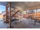 Under deck patio area with covered seating at 9488 Brook Ln, Lone Tree, CO 80124