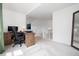 Bright office space with neutral carpet and a built-in desk, perfect for remote work or study, upstairs loft area at 10938 Mcclellan Rd, Parker, CO 80134