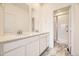 Spacious bathroom with double vanity and walk-in shower with glass door at 2002 S Haleyville Way, Aurora, CO 80018