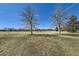 Expansive green space with trees and clear blue skies at 2575 S Syracuse Way # H106, Denver, CO 80231