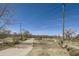 A paved walking path leading to a natural open area at 2575 S Syracuse Way # H106, Denver, CO 80231