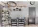 Small dining area with black table and chairs at 1331 4Th St, Fort Lupton, CO 80621