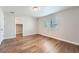 Spacious bedroom with hardwood floors and walk-in closet at 16700 Alzere Pl, Parker, CO 80134