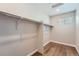 Spacious walk-in closet with ample hanging space and shelving at 16700 Alzere Pl, Parker, CO 80134