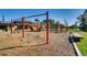 playground with swings, slides, and play structures at 16700 Alzere Pl, Parker, CO 80134