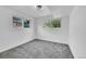 A cozy bedroom featuring natural light and neutral carpet at 1173 Xenon St, Golden, CO 80401