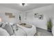 Bedroom with soft decor and ample lighting featuring carpeted flooring and closet at 1173 Xenon St, Golden, CO 80401