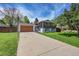 Charming two-story home with a spacious driveway and well-manicured lawn at 1173 Xenon St, Golden, CO 80401