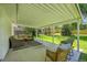 Enjoy the expansive backyard from the shaded comfort of the covered patio at 1173 Xenon St, Golden, CO 80401