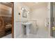 Bathroom featuring a standing sink with a sauna in the background at 11406 Conifer Ridge Dr, Conifer, CO 80433