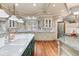 Custom kitchen with ample counter space, island, and stainless steel appliances at 11406 Conifer Ridge Dr, Conifer, CO 80433