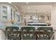 Kitchen with breakfast bar, island with marble countertop, and stainless steel appliances at 11406 Conifer Ridge Dr, Conifer, CO 80433