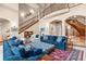 Beautiful home with open floor plan and natural light plus an elegant staircase at 11406 Conifer Ridge Dr, Conifer, CO 80433