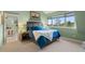 Bright and airy main bedroom with a view of the forest at 11406 Conifer Ridge Dr, Conifer, CO 80433
