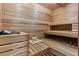 Sauna with wooden benches and towel at 11406 Conifer Ridge Dr, Conifer, CO 80433