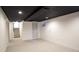 This finished basement features recessed lights and access to stairs at 13833 W 68Th Ave, Arvada, CO 80004
